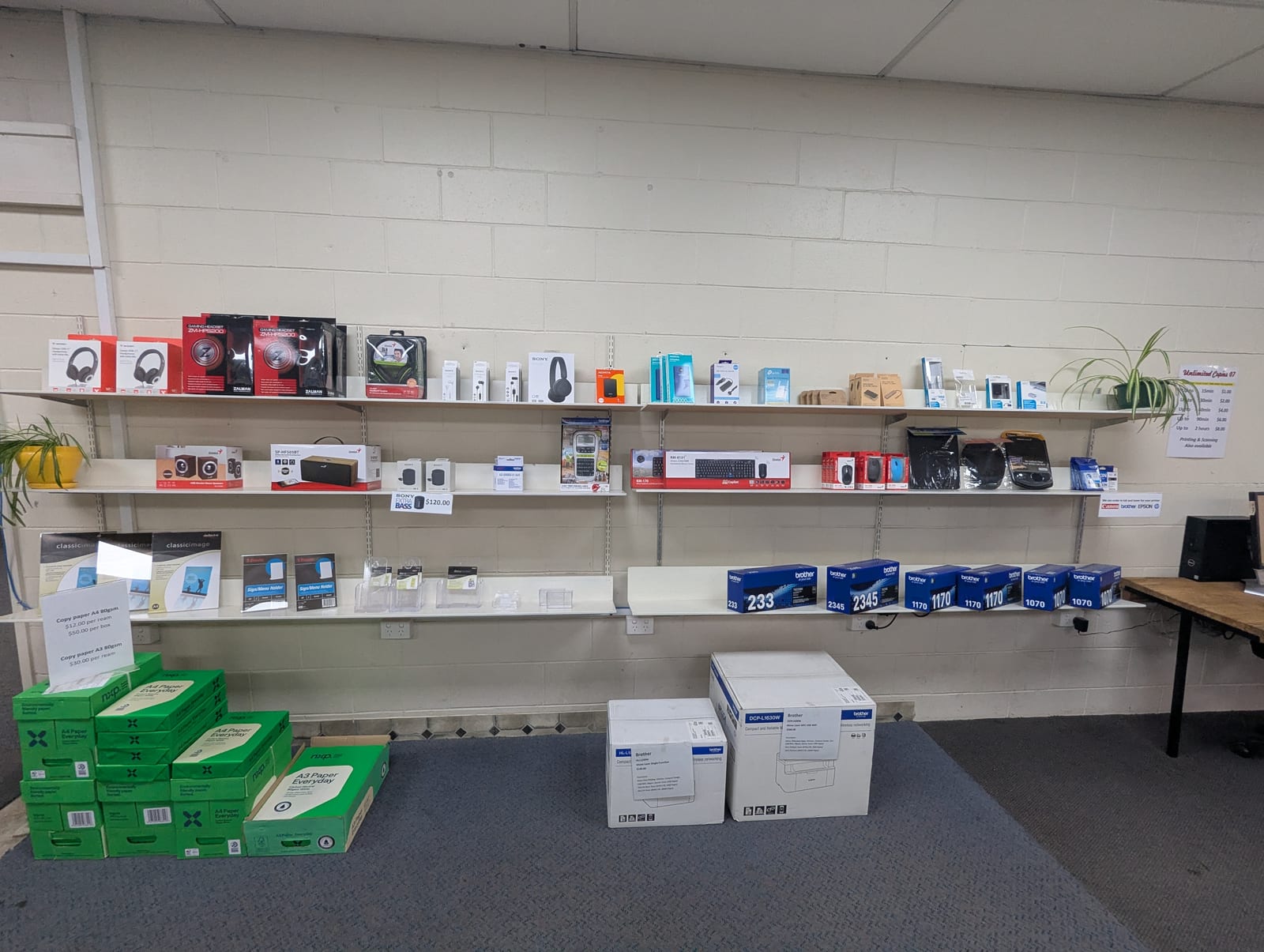 Print equipment and Post Haste courier signage in the shop